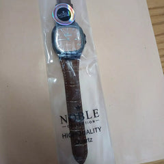 Noble Collection dark-colored bezel & brown leather strap Watch