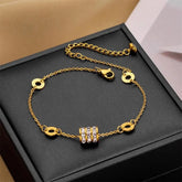 Gold Roman Numeral & Crystal Charm Bracelet