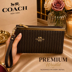 COACH Textured Leather Zip Wristlet