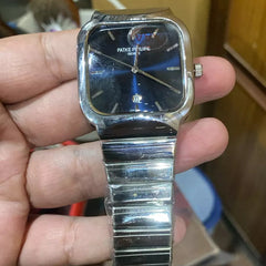 Patek Philippe Geneve silver-tone analog watch