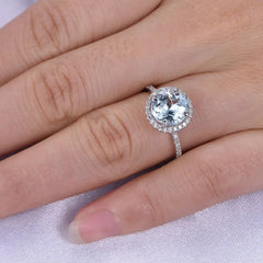 Round Aquamarine Halo Ring with Diamond Accents