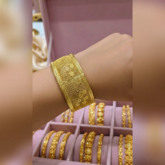 Gold cuff bangles