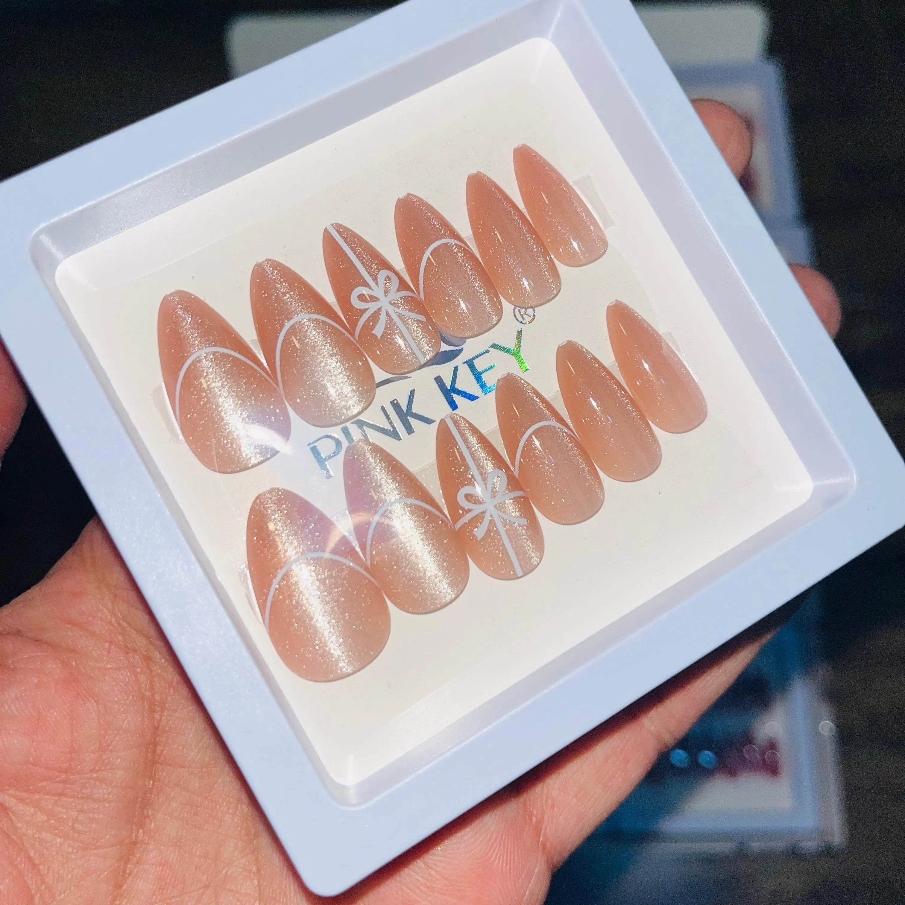 Pink key Stylish Cute Bow Salon Look Artifical Nails With Free Stickers (12 Pcs)