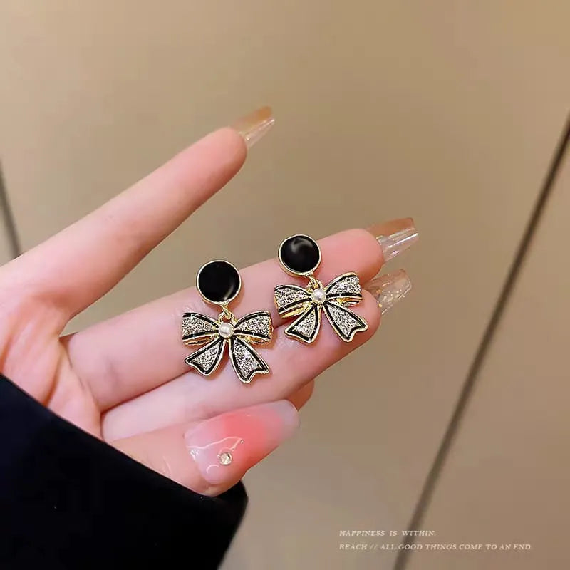 Rhinestone Bow Black Round Stud