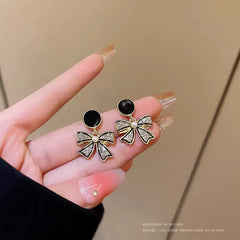 Rhinestone Bow Black Round Stud