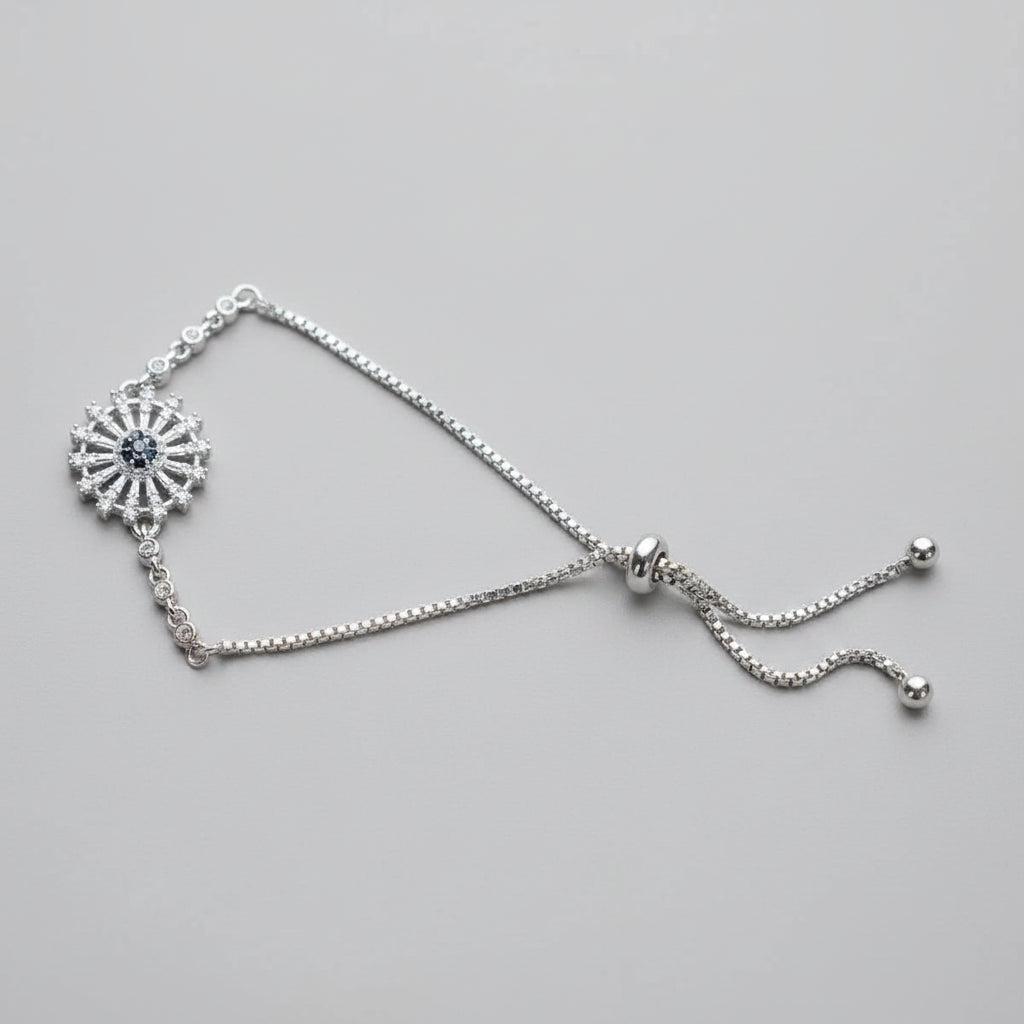 Silver Sunburst Evil Eye Bolo Bracelet with Black Center Stone – Adjustable Slider Chain