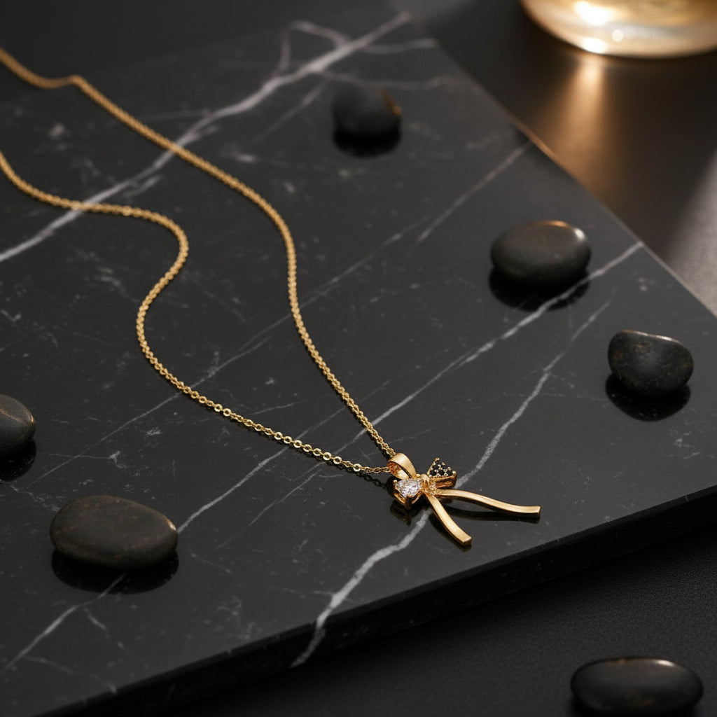Gold Bow Pendant Necklace - Each