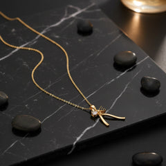 Gold Bow Pendant Necklace - Each