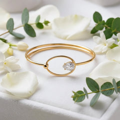 elegant gold-tone wire bangle - Each