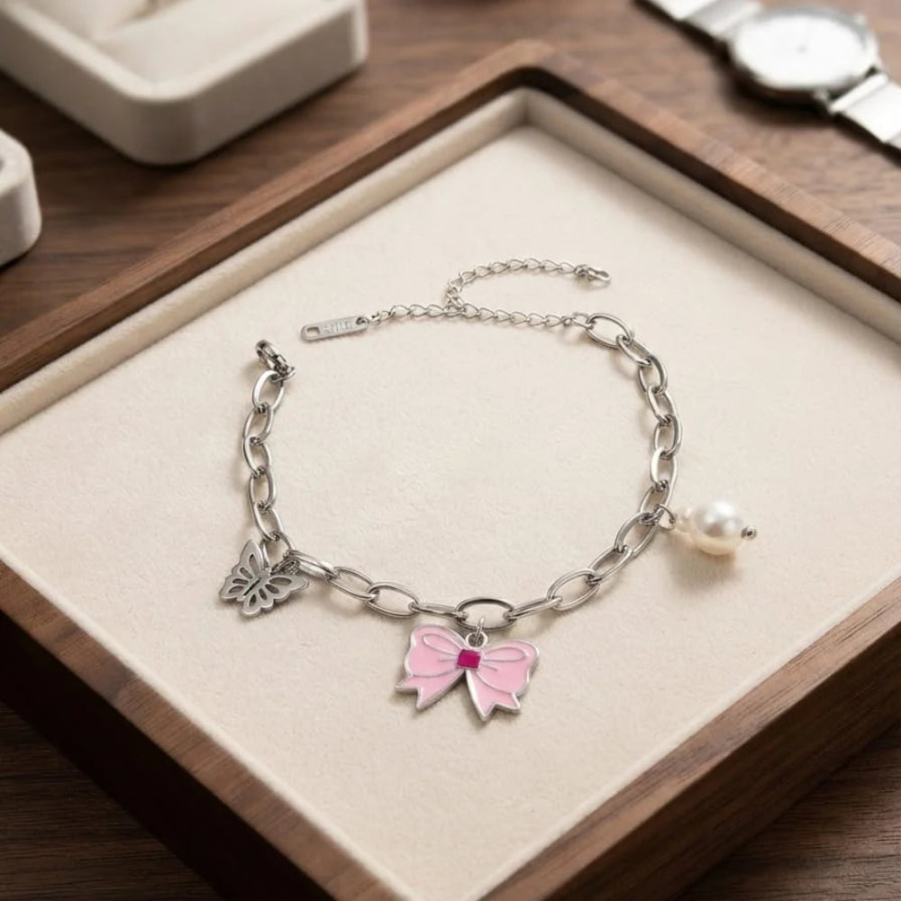 Silver Charm Bracelet featuring a Pink Bow and Butterfly - Each