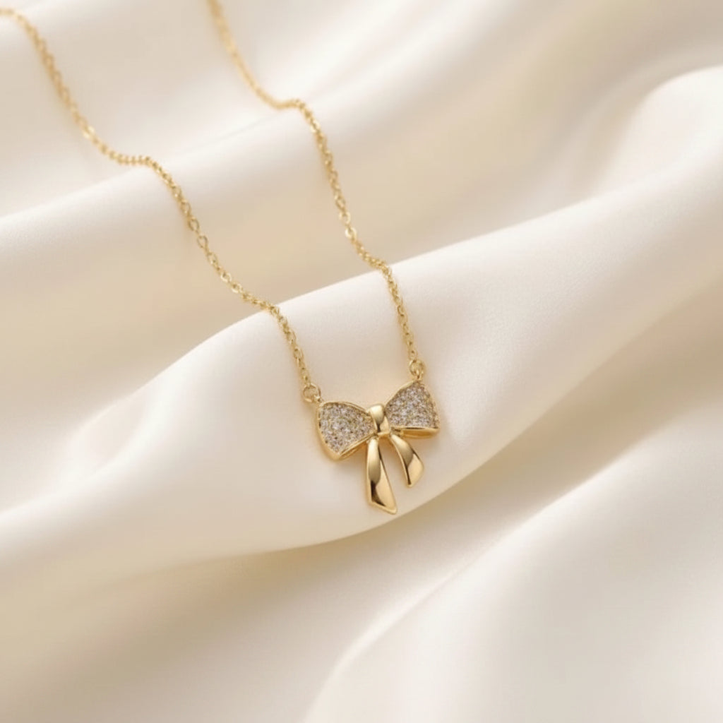 Gold Ribbon Bow Necklace - Each