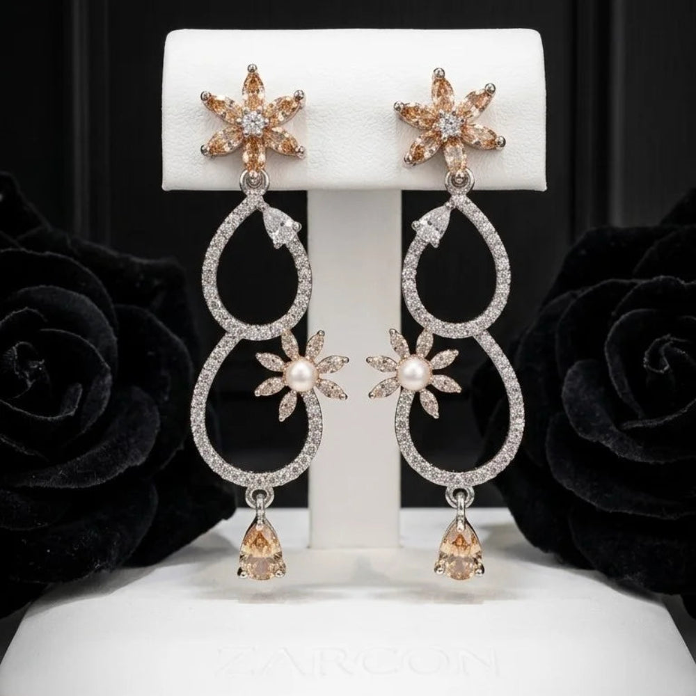 floral-shaped studs with champagne-colored stones Earings