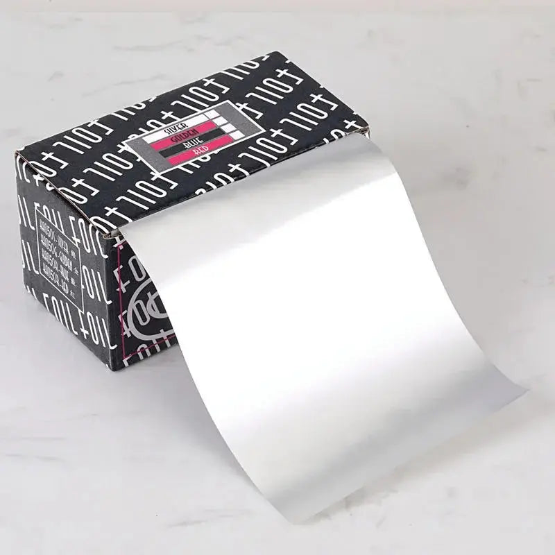 Professional salon styling tool in silver aluminum Foil for highlighting hair coloring
