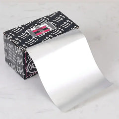 Professional salon styling tool in silver aluminum Foil for highlighting hair coloring