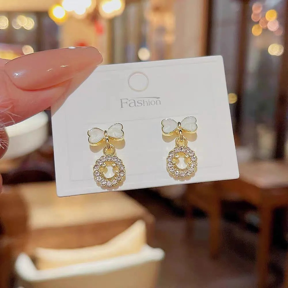 Elegant Bow Hollow Circle Drop Earrings – Each