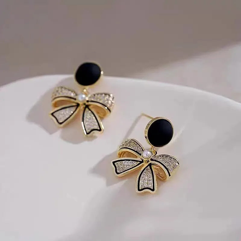 Rhinestone Bow Black Round Stud