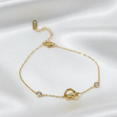 Gold Plated Chain Bracelet Featuring A Knot Motif