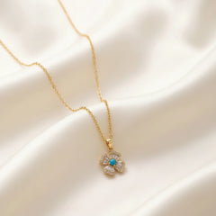 Gold Plated Four Leaf Floral Pendant Necklace with Blue Gemstone - Each