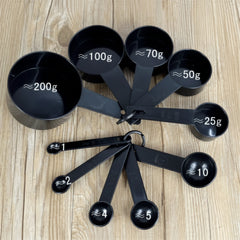 10-piece set of black plastic measuring cups and spoons. - Each Set
